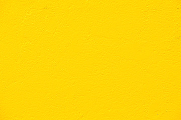 Colorful wall yellow paint on concrete wal background