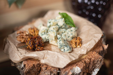 Buffet menu of the catering company on a wooden table in a restaurant