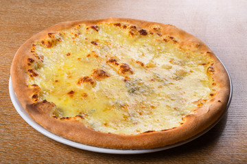 Quattro formaggi is a variety of Italian pizza topped with: mozzarella, gorgonzola, parmesan