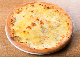 Quattro formaggi is a variety of Italian pizza topped with: mozzarella, gorgonzola, parmesan