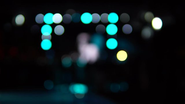 Entertainment concept, blurred party, bright stage and color bokeh lights. Nightlife.