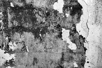 Texture of a concrete wall with cracks and scratches which can be used as a background