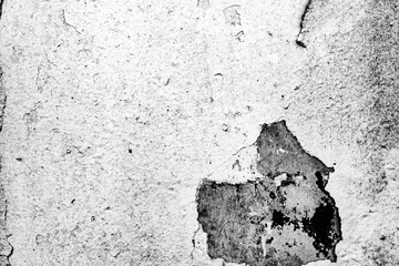 Texture of a concrete wall with cracks and scratches which can be used as a background