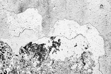 Texture of a concrete wall with cracks and scratches which can be used as a background