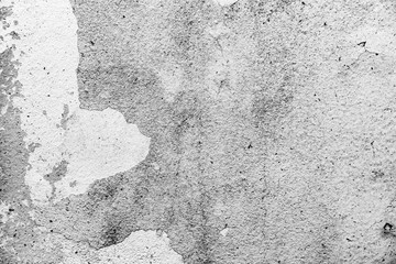 Texture of a concrete wall with cracks and scratches which can be used as a background