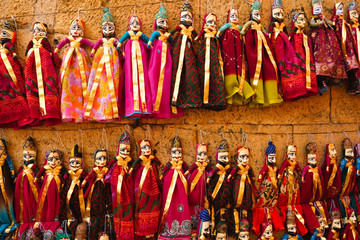 Fototapeta premium Colorful handmade traditional Rajasthani puppets for sale in Jaisalmer, Rajasthan, India.