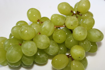Close up of bunch of grapes on isolated background.