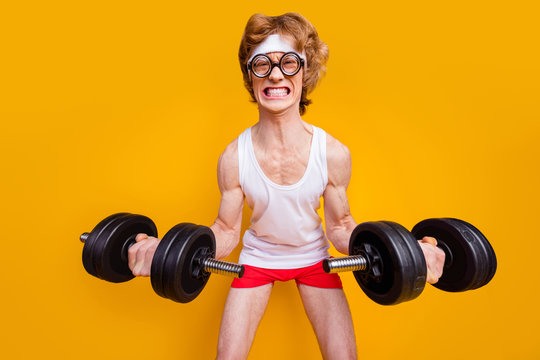 Portrait of his he nice funky motivated mad foxy guy lifting barbell doing work out trainer program regime body building goal isolated over bright vivid shine vibrant yellow color background