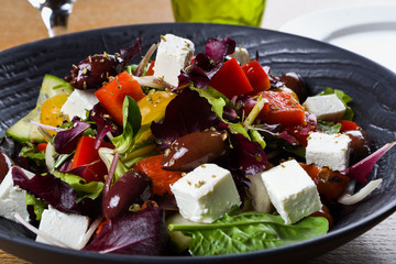 Greek salad or horiatiki salad is a salad in Greek cuisine. Greek salad is made with tomatoes