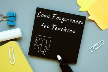Financial concept about Loan Forgiveness For Teachers with inscription on the sheet.