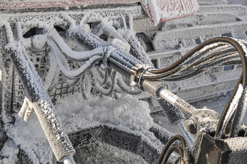 Close-up Frozen hydraulic pipes of a Ratrack machine at the High alpine Road  in Austria 