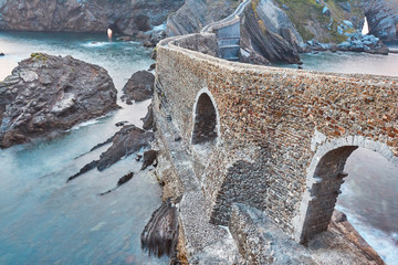 Sunset dramatic coastline in Spain. San Juan de Gaztelugatxe