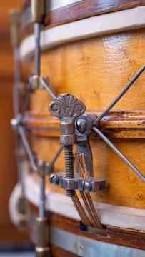 Close up shot of snare drum tension mechanism from the late 1880s 