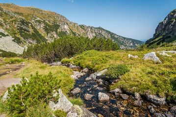Beautiful mountain scenery in a sunny summer day. Rila mountain, Bulgaria. Hiking/ trekking concept.