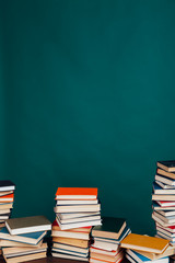 many stacks of educational books to prepare for exams in the university library