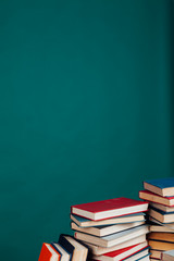many stacks of educational books to prepare for exams in the university library