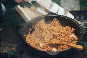 pilaf in a cauldron in nature pilaf recipe step by step