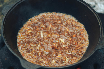 pilaf in a cauldron in nature pilaf recipe step by step