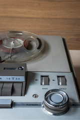 Fototapeta premium start of old tape recorder, play, pause, rewind, man playing