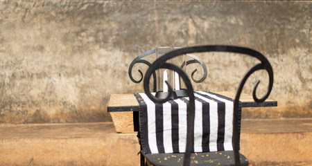 old metal chair with table