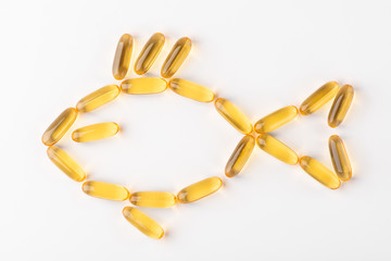 Fish shape made of cod liver oil capsules