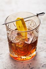 Sazerac cocktail brandy absinth old-fashioned glass. Strong alcoholic cocktail. Cognac, whiskey, rum