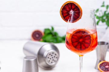Aperol spritz cocktail with blood orange