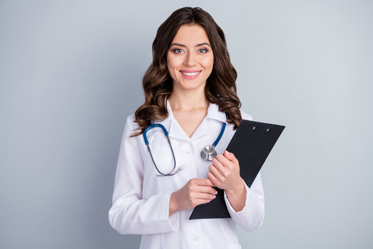 Photo of beautiful cheerful professional doc practitioner intern lady hold patient papers medical prescriptions wear white lab coat stethoscope isolated grey color background