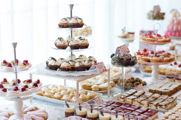 delicious candy bar on white table