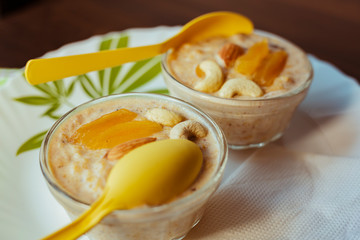Cornflakes kheer or sweet pudding with dry fruits served in glass bowls
