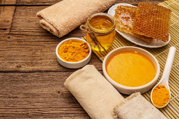 Spa concept. Self care with honey and turmeric. Natural organic cosmetics, homemade product, alternative lifestyle. Vintage background