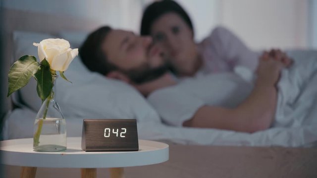 Selective focus of woman suffering from snoring boyfriend at night