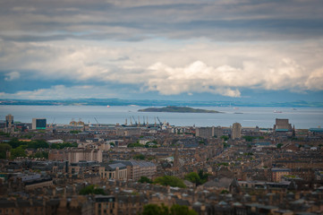 Fototapeta na wymiar Tilt shift effect of Edinburgh, with the sea in the background