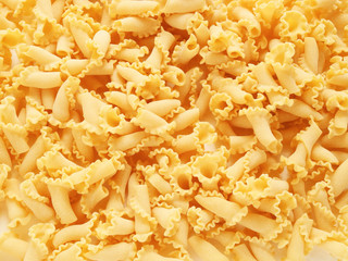 uncooked pasta Campanelle, background
