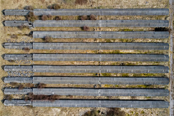 A number of barns on an old abandoned farm