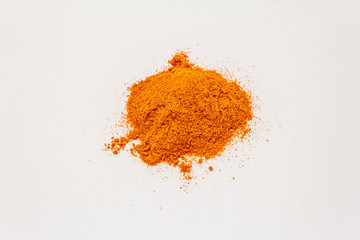 Hungarian hot paprika powder isolated on white background