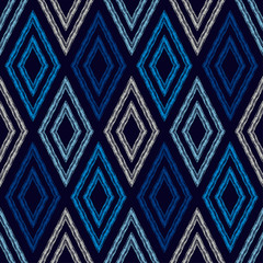 Rhombuses. Patterned texture. Ethnic boho ornament. Seamless background. Vector illustration for web design or print.