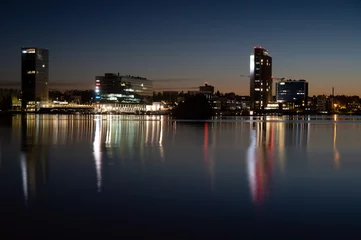 Foto op Plexiglas Night cityscape from Keilaniemi, Espoo business district showcasing the oldest highrise building in Finland. © Marko Hannula