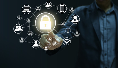 Businessman pressing icon for security Internet online business (concept pointing security services)