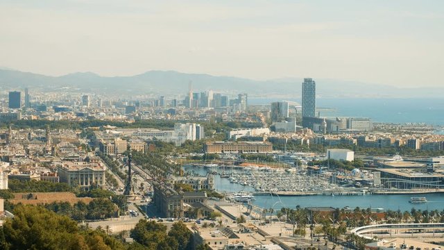 Seaport in Barcelona. Coast with moored yachts. Shooting from a height