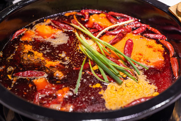 Sichuan boiling hotpot with chili pepper in Chengdu, Sichuan province, China - obrazy, fototapety, plakaty