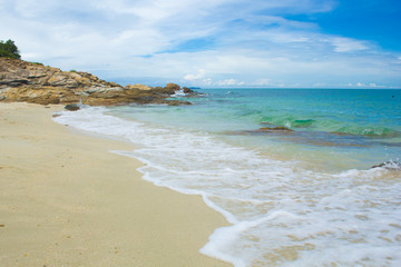 Soft Wave Of Blue Ocean On Sandy Beach