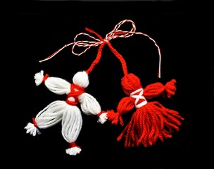 Handmade Women and men, known as Martisor, with red and white string. It is a Romanian traditional...