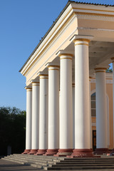 White columns with gold pattern of the theatre.  Old restored Building of the times of the USSR