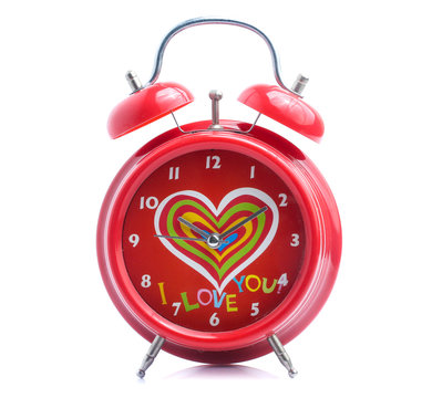 Red alarm clock,  white background