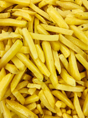 lots of potato for cooking fries for food as a background