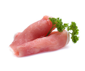 Raw pork meat with parsley herb leaves isolated on white background