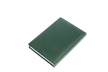 green notebook on the white background 