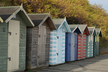 Fototapeta na wymiar Colourful beach huts, South Beach in Lowesoft, Norfolk, UK