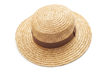 Fototapeta na wymiar Boater straw hat isolated shot in the Studio. Concept of fashion clothing accessories and beach holidays